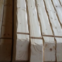 LAVORAZIONE-TRAVI-SPIGOLI-ARROTONDATI-IRREGOLARMENTE